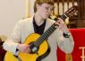 Foto: KuKuHU<br>John-Robin Bold (klassische Gitarre) in der Erlöserkirche