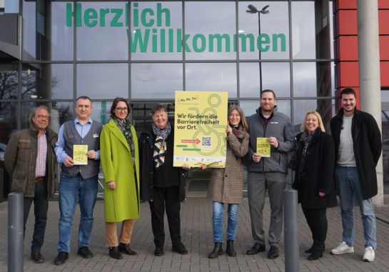 Thorsten Luckow, Cihan Özen (Marktkauf-Geschäftsleiter), Ulrike Schmidt, Uta Herrnring-Vollmer und Britta Brünn, Christian Leder (HHG-Vorsitzender) Sandra Fait-Böhme (Kreis Segeberg) und Steffen Zestermann (HHG)